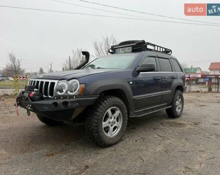 Синій Джип Grand Cherokee, об'ємом двигуна 5.65 л та пробігом 230 тис. км за 15900 $, фото 1 на Automoto.ua