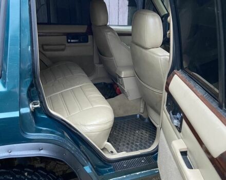 Зеленый Джип Гранд Чероки, объемом двигателя 4 л и пробегом 260 тыс. км за 3999 $, фото 1 на Automoto.ua