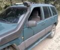 Зеленый Джип Гранд Чероки, объемом двигателя 2.5 л и пробегом 312 тыс. км за 9600 $, фото 4 на Automoto.ua