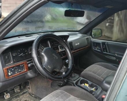 Зеленый Джип Гранд Чероки, объемом двигателя 2.5 л и пробегом 312 тыс. км за 9600 $, фото 1 на Automoto.ua