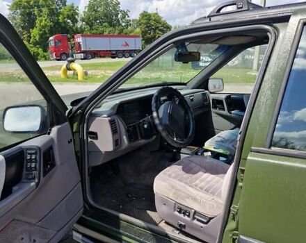 Зеленый Джип Гранд Чероки, объемом двигателя 4 л и пробегом 700 тыс. км за 6000 $, фото 6 на Automoto.ua