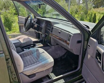 Зеленый Джип Гранд Чероки, объемом двигателя 4 л и пробегом 700 тыс. км за 6000 $, фото 10 на Automoto.ua