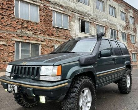 Зелений Джип Grand Cherokee, об'ємом двигуна 0.52 л та пробігом 212 тис. км за 6000 $, фото 4 на Automoto.ua