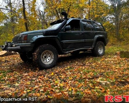 Зеленый Джип Гранд Чероки, объемом двигателя 5.2 л и пробегом 200 тыс. км за 5000 $, фото 3 на Automoto.ua