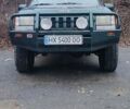 Зелений Джип Grand Cherokee, об'ємом двигуна 5.2 л та пробігом 421 тис. км за 3000 $, фото 1 на Automoto.ua