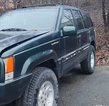 Зелений Джип Grand Cherokee, об'ємом двигуна 5.2 л та пробігом 421 тис. км за 3000 $, фото 3 на Automoto.ua