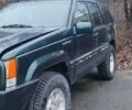 Зелений Джип Grand Cherokee, об'ємом двигуна 5.2 л та пробігом 421 тис. км за 3000 $, фото 3 на Automoto.ua