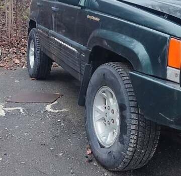 Зелений Джип Grand Cherokee, об'ємом двигуна 5.2 л та пробігом 421 тис. км за 3000 $, фото 2 на Automoto.ua