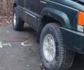 Зелений Джип Grand Cherokee, об'ємом двигуна 5.2 л та пробігом 421 тис. км за 3000 $, фото 2 на Automoto.ua
