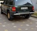 Зелений Джип Grand Cherokee, об'ємом двигуна 4 л та пробігом 382 тис. км за 4600 $, фото 1 на Automoto.ua