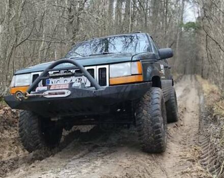 Зеленый Джип Гранд Чероки, объемом двигателя 2.5 л и пробегом 352 тыс. км за 4500 $, фото 3 на Automoto.ua