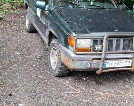 Зеленый Джип Гранд Чероки, объемом двигателя 2.5 л и пробегом 370 тыс. км за 3000 $, фото 4 на Automoto.ua