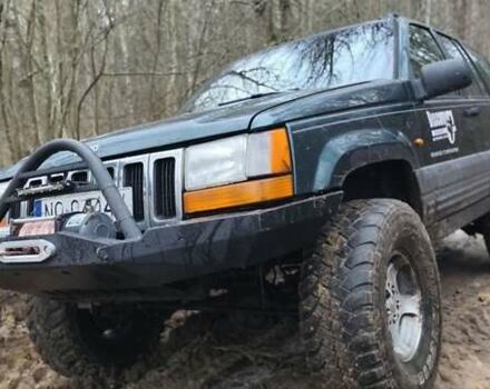 Зеленый Джип Гранд Чероки, объемом двигателя 2.5 л и пробегом 352 тыс. км за 4500 $, фото 1 на Automoto.ua