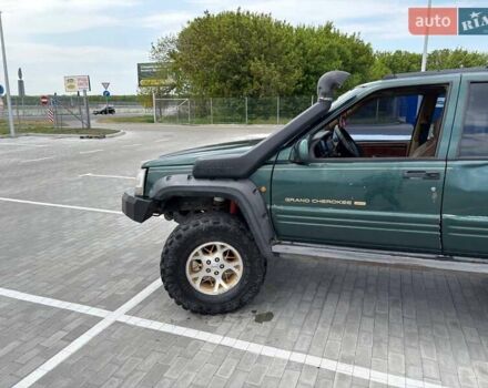 Зеленый Джип Гранд Чероки, объемом двигателя 3.96 л и пробегом 200 тыс. км за 4500 $, фото 4 на Automoto.ua