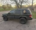 Зелений Джип Grand Cherokee, об'ємом двигуна 5.2 л та пробігом 270 тис. км за 6000 $, фото 1 на Automoto.ua