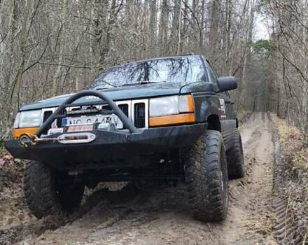 Зеленый Джип Гранд Чероки, объемом двигателя 2.5 л и пробегом 352 тыс. км за 4500 $, фото 2 на Automoto.ua