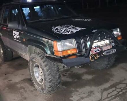 Зеленый Джип Гранд Чероки, объемом двигателя 2.5 л и пробегом 352 тыс. км за 4500 $, фото 5 на Automoto.ua