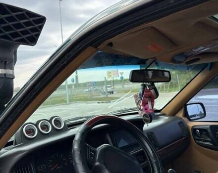 Зеленый Джип Гранд Чероки, объемом двигателя 3.96 л и пробегом 200 тыс. км за 4500 $, фото 3 на Automoto.ua