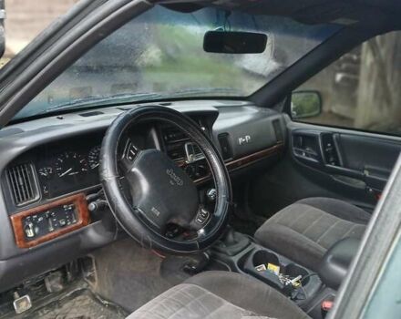 Зеленый Джип Гранд Чероки, объемом двигателя 2.5 л и пробегом 312 тыс. км за 9600 $, фото 2 на Automoto.ua