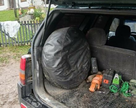 Зеленый Джип Гранд Чероки, объемом двигателя 2.5 л и пробегом 312 тыс. км за 9600 $, фото 3 на Automoto.ua