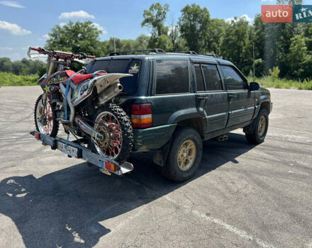 Зелений Джип Grand Cherokee, об'ємом двигуна 5.2 л та пробігом 140 тис. км за 6000 $, фото 5 на Automoto.ua
