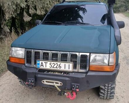 Зеленый Джип Гранд Чероки, объемом двигателя 2.5 л и пробегом 312 тыс. км за 9600 $, фото 6 на Automoto.ua