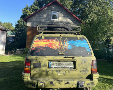 Зеленый Джип Гранд Чероки, объемом двигателя 2.5 л и пробегом 260 тыс. км за 5200 $, фото 1 на Automoto.ua