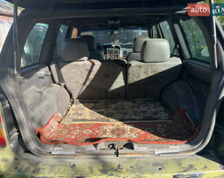 Зеленый Джип Гранд Чероки, объемом двигателя 2.5 л и пробегом 260 тыс. км за 5200 $, фото 10 на Automoto.ua