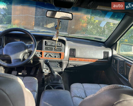 Зеленый Джип Гранд Чероки, объемом двигателя 2.5 л и пробегом 260 тыс. км за 5200 $, фото 6 на Automoto.ua