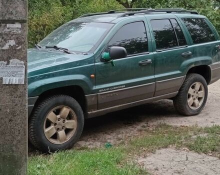 Зелений Джип Grand Cherokee, об'ємом двигуна 4 л та пробігом 200 тис. км за 2800 $, фото 1 на Automoto.ua