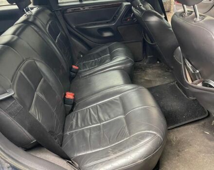 Зеленый Джип Гранд Чероки, объемом двигателя 3.1 л и пробегом 250 тыс. км за 2248 $, фото 1 на Automoto.ua