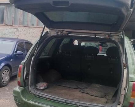 Зеленый Джип Гранд Чероки, объемом двигателя 3.12 л и пробегом 232 тыс. км за 3600 $, фото 4 на Automoto.ua