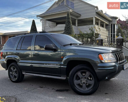 Зелений Джип Grand Cherokee, об'ємом двигуна 2.7 л та пробігом 376 тис. км за 9800 $, фото 13 на Automoto.ua