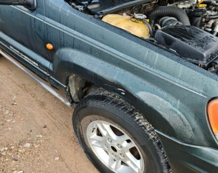 Зелений Джип Grand Cherokee, об'ємом двигуна 3.1 л та пробігом 260 тис. км за 4059 $, фото 3 на Automoto.ua