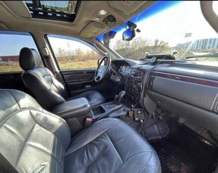 Зеленый Джип Гранд Чероки, объемом двигателя 2.7 л и пробегом 200 тыс. км за 3544 $, фото 4 на Automoto.ua