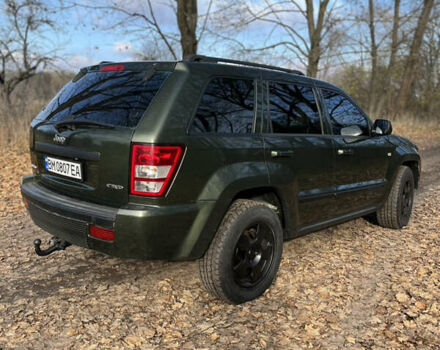 Зеленый Джип Гранд Чероки, объемом двигателя 2.99 л и пробегом 303 тыс. км за 9000 $, фото 1 на Automoto.ua