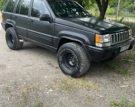 Зелений Джип Grand Cherokee, об'ємом двигуна 3 л та пробігом 2 тис. км за 6900 $, фото 1 на Automoto.ua