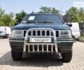 Зелений Джип Grand Cherokee, об'ємом двигуна 5.2 л та пробігом 213 тис. км за 4950 $, фото 1 на Automoto.ua