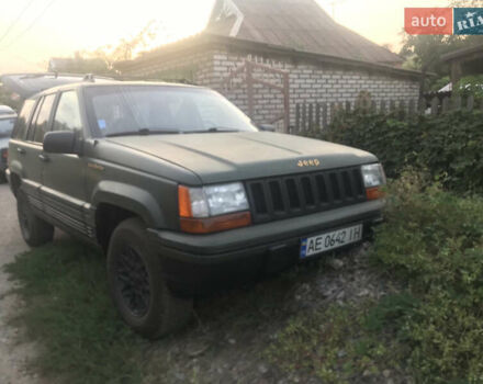 Зелений Джип Grand Cherokee, об'ємом двигуна 5.2 л та пробігом 247 тис. км за 4800 $, фото 1 на Automoto.ua