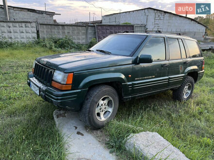Зелений Джип Grand Cherokee, об'ємом двигуна 2.5 л та пробігом 384 тис. км за 3750 $, фото 1 на Automoto.ua