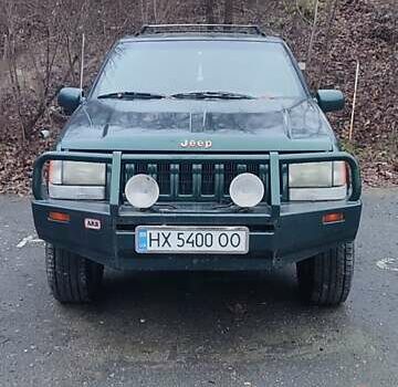 Зелений Джип Grand Cherokee, об'ємом двигуна 5.2 л та пробігом 421 тис. км за 3000 $, фото 1 на Automoto.ua
