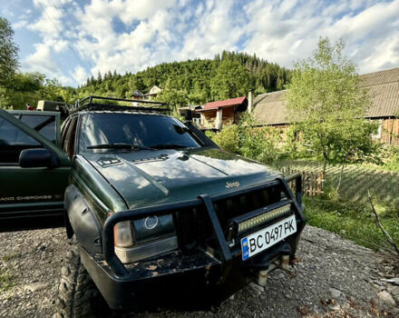 Зелений Джип Grand Cherokee, об'ємом двигуна 5.21 л та пробігом 250 тис. км за 9100 $, фото 1 на Automoto.ua