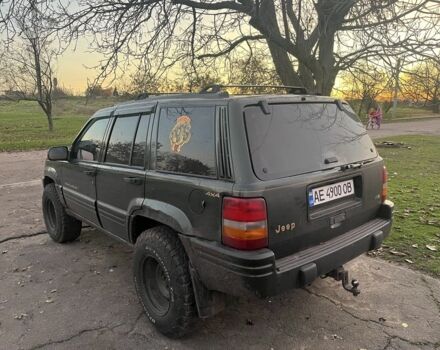 Зеленый Джип Гранд Чероки, объемом двигателя 5.2 л и пробегом 270 тыс. км за 6000 $, фото 1 на Automoto.ua