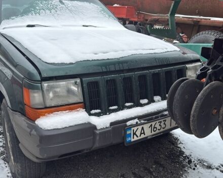 Зеленый Джип Гранд Чероки, объемом двигателя 4 л и пробегом 500 тыс. км за 3500 $, фото 1 на Automoto.ua