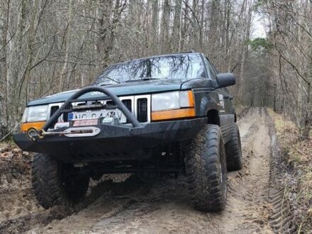 Зелений Джип Grand Cherokee, об'ємом двигуна 2.5 л та пробігом 332 тис. км за 4500 $, фото 1 на Automoto.ua