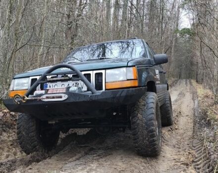 Зеленый Джип Гранд Чероки, объемом двигателя 2.5 л и пробегом 332 тыс. км за 4500 $, фото 1 на Automoto.ua