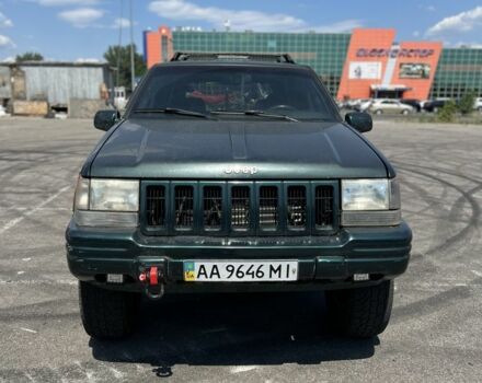 Зеленый Джип Гранд Чероки, объемом двигателя 5.2 л и пробегом 140 тыс. км за 6000 $, фото 1 на Automoto.ua