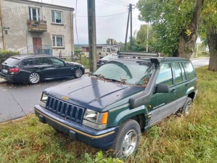 Зелений Джип Grand Cherokee, об'ємом двигуна 4 л та пробігом 240 тис. км за 2000 $, фото 1 на Automoto.ua