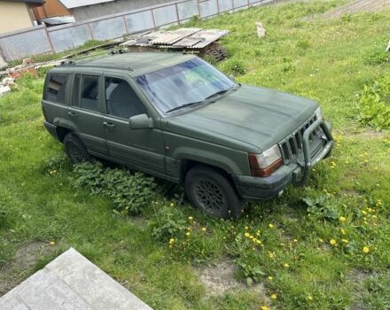 Зеленый Джип Гранд Чероки, объемом двигателя 2.5 л и пробегом 300 тыс. км за 3000 $, фото 1 на Automoto.ua