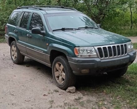 Зеленый Джип Гранд Чероки, объемом двигателя 4 л и пробегом 200 тыс. км за 2800 $, фото 1 на Automoto.ua